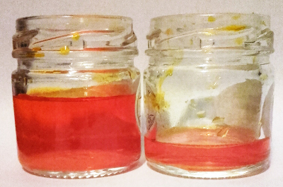 Mango Flavouring with orange colour. The Concentation is the same in each jar. Copyright (c)2020 Paul Alan Grosse