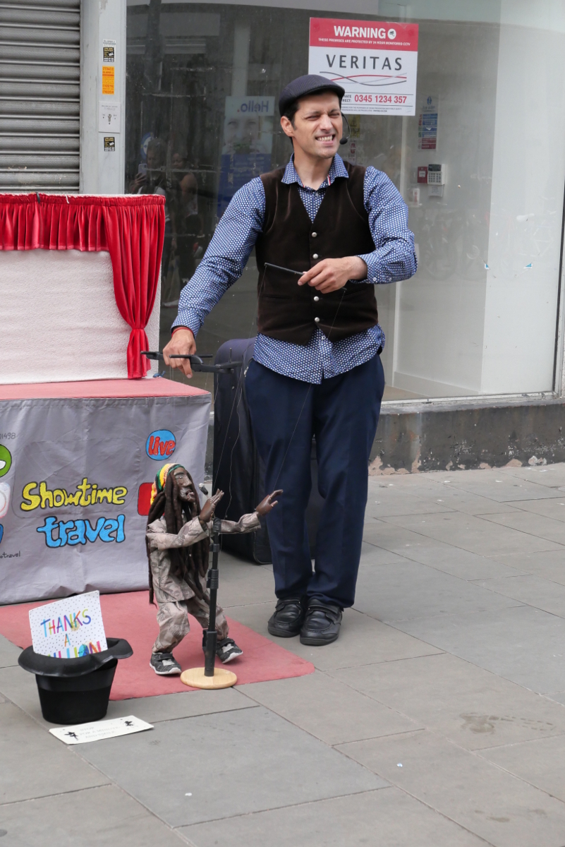 Derby: Questionable street entertainer 20220729 Copyright (c)2022 Paul Alan Grosse. All Rights Reserved.