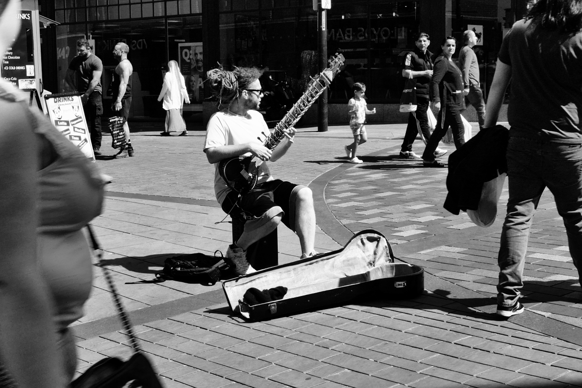 Derby: Busker - Sitar. Photograph Copyright (c)2023 Paul Alan Grosse. All Rights Reserved.