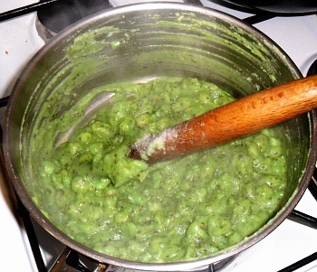 Mushy peas with mint sauce, salt and vinegar.