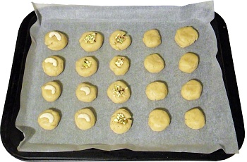 Roll them into balls, slightly flatten them and put whatever you want on them.