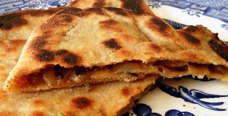 Stuffed, one-piece paratha, hot and ready to eat.