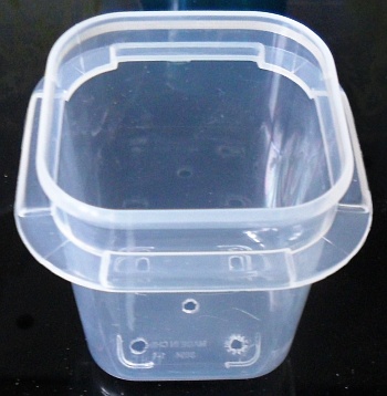 A small, cheap container, with a few holes in the bottom...
