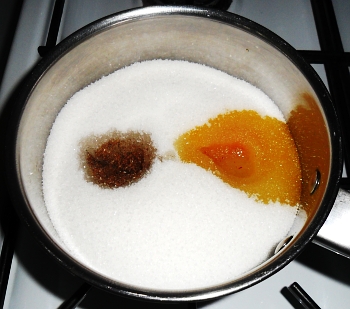 The sugar the milkpan with the washes from cardamom and saffron